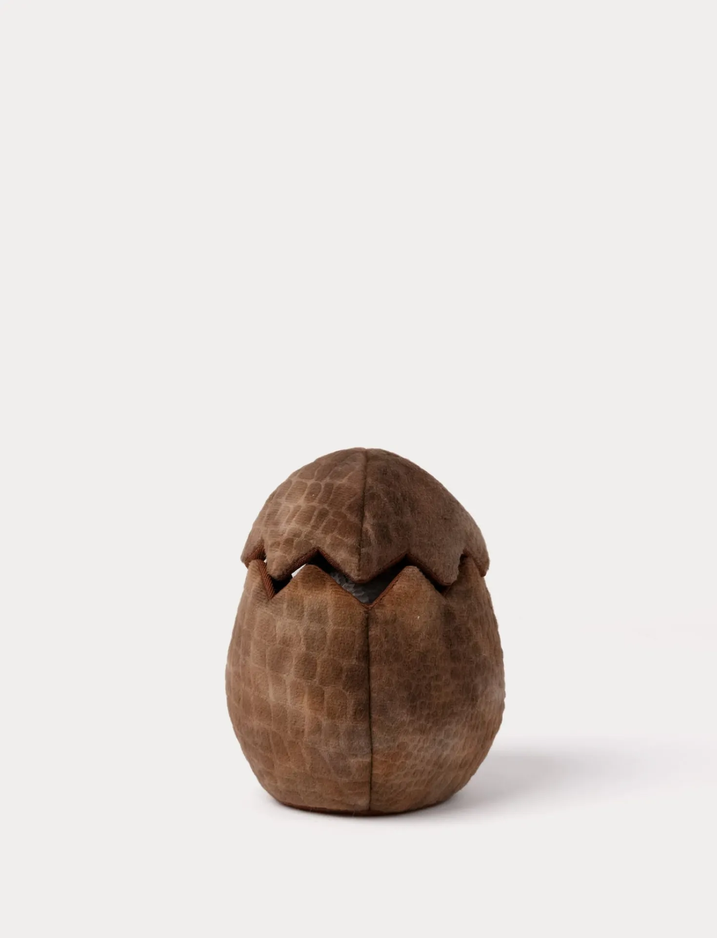 Handdocka, Stegosaurus i ägg