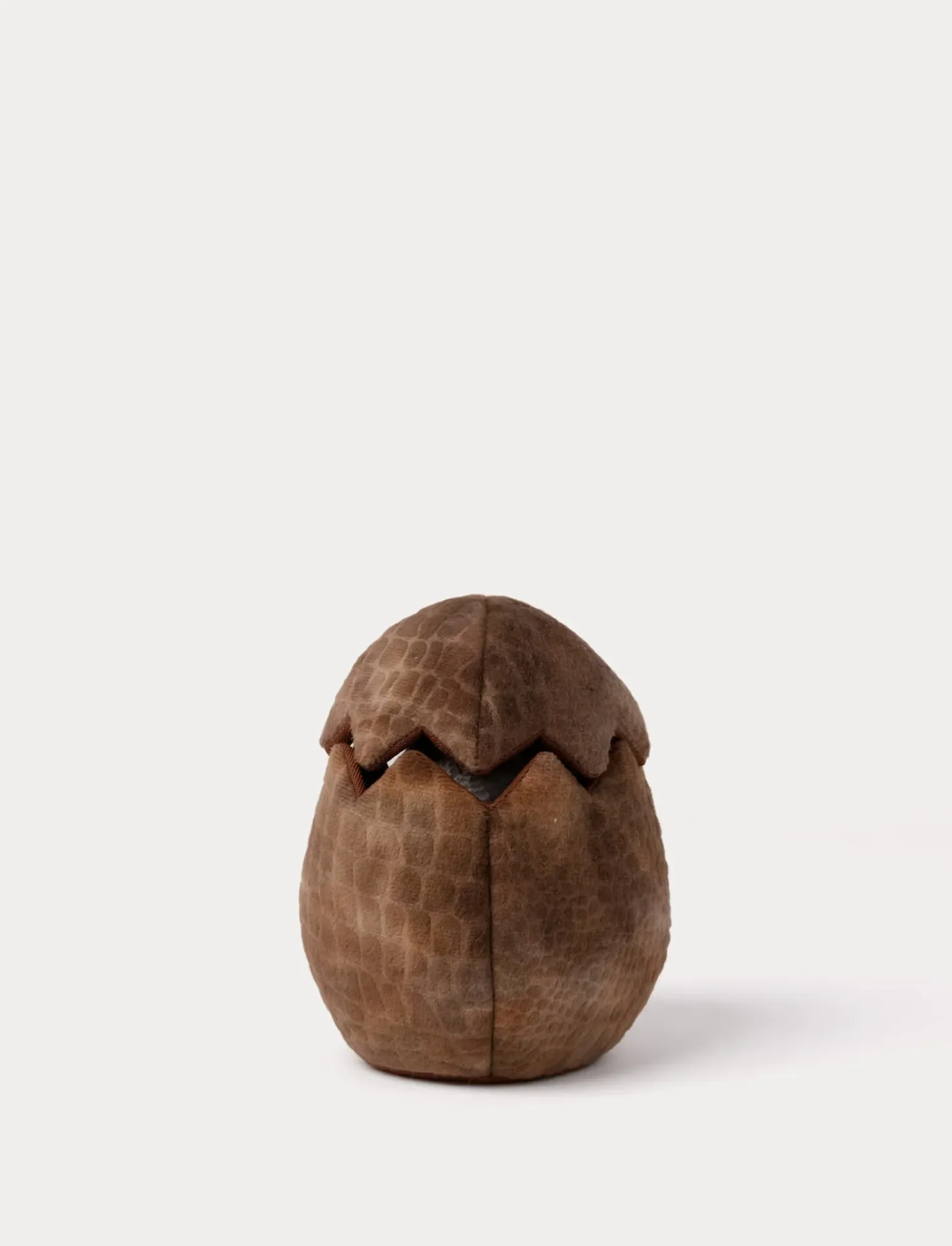 Handdocka, Stegosaurus i ägg